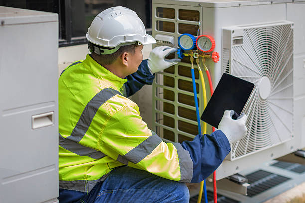 Professional Hvac technician working in Louisville, IL